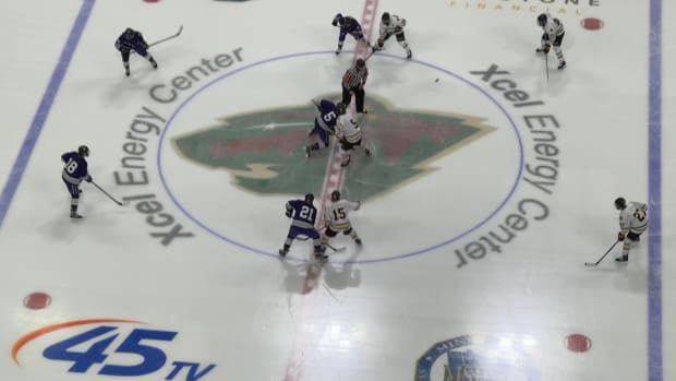 The opening faceoff of a Class A boys state hockey quarterfinal between Warroad and New Ulm at Xcel Energy Center in St. Paul, Minn., on Wednesday, March 6, 2024.